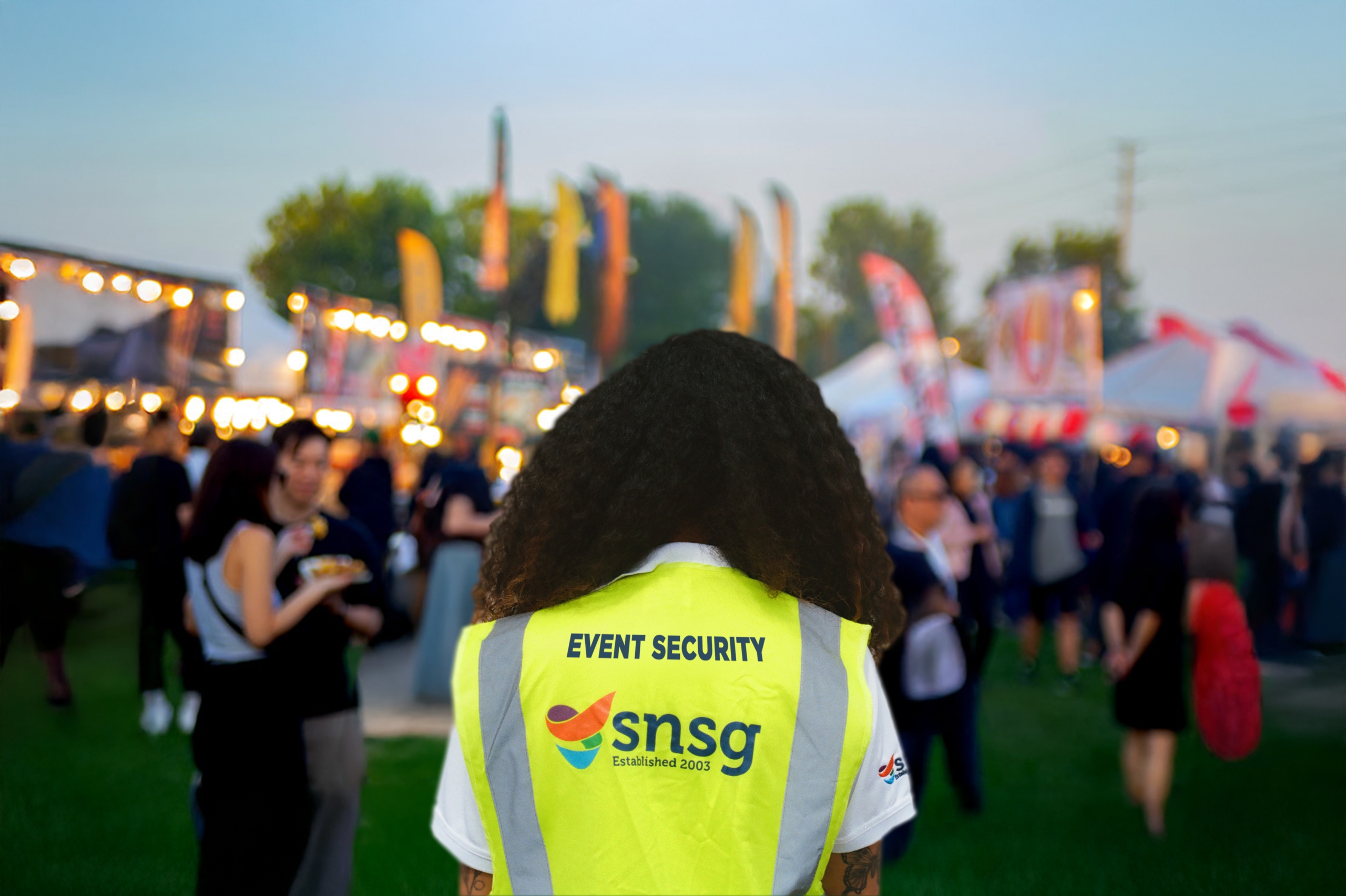An SNSG Event Security Guard on duty at a festival in the UK.