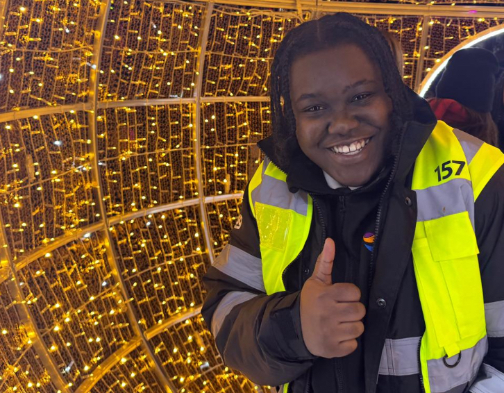 One of our SIA Licensed Manned Guards smiling and holding thumbs up.